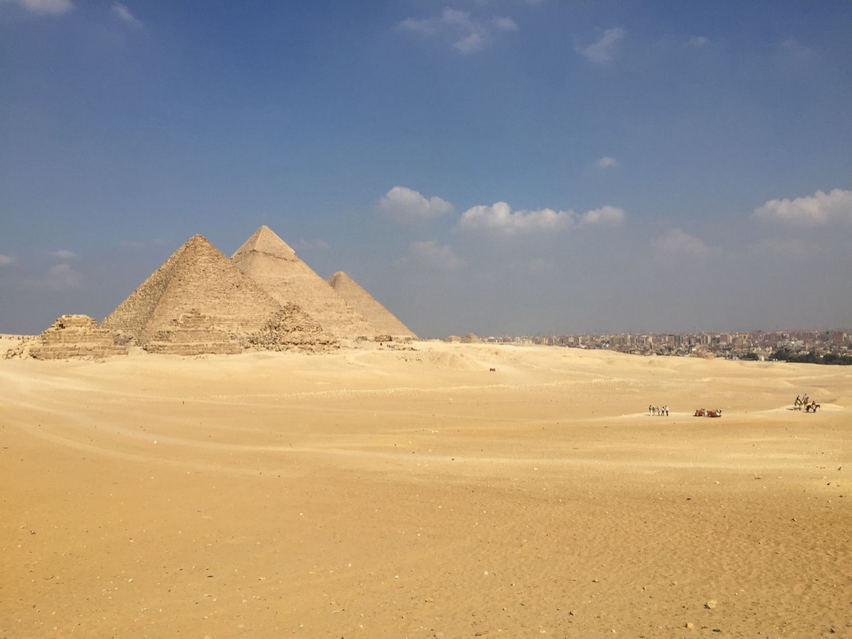 Pyramids and cityscape