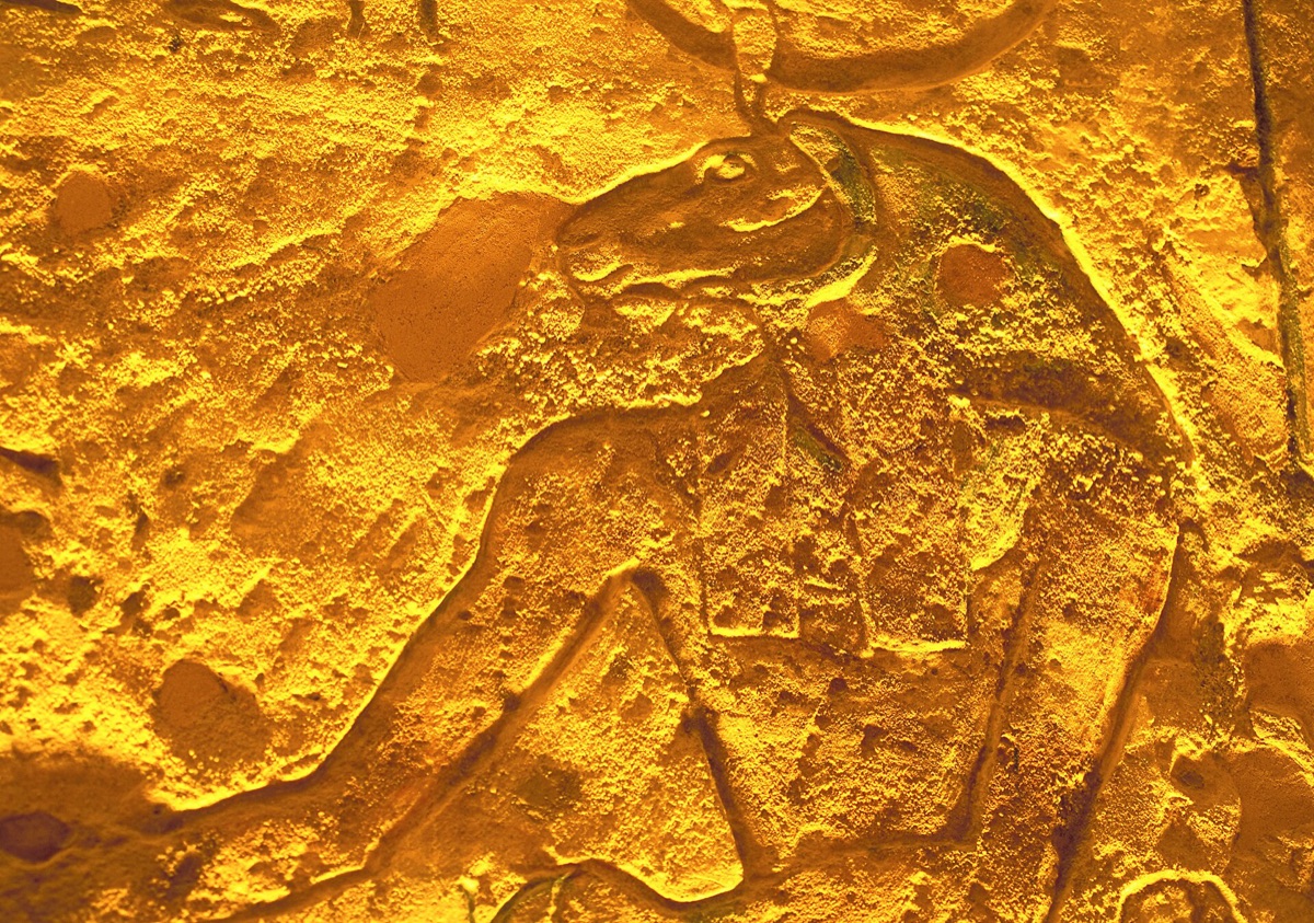 Close-up of Abu Simbel temple interior showing religious artifacts and ancient inscriptions