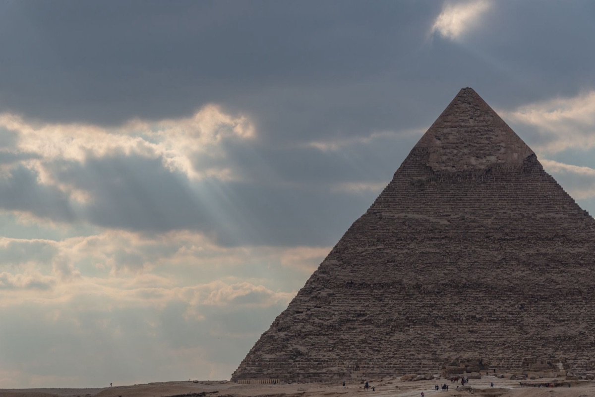 Ancient Egyptian temple with sun rays