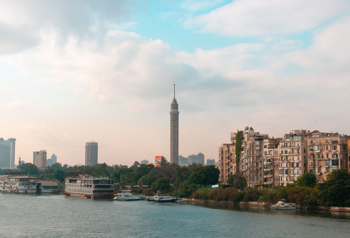 nile cruise boat on river with sunset
