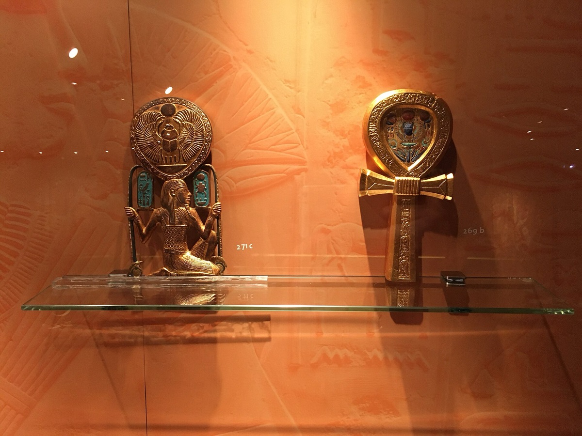 Tutankhamun tomb interior with hieroglyphic wall carvings